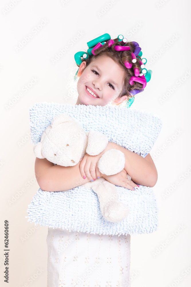 Cute little girl in curlers and pajamas sleep bedtime Cute little girl in curlers and pajamas sleep bedtime