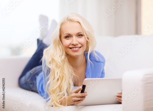 smiling woman with tablet pc computer at home Free Download smiling woman with tablet pc computer at home - GFXLoad
