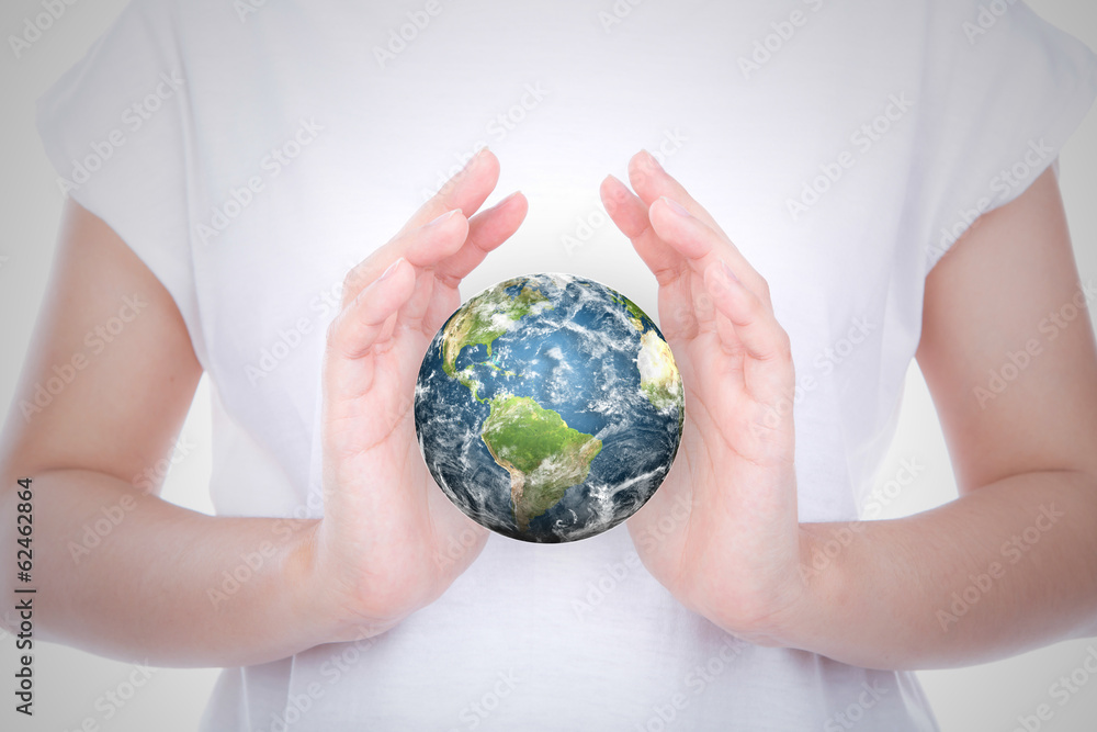 Hands with earth (Elements of this image furnished by NASA) Hands with earth (Elements of this image furnished by NASA)