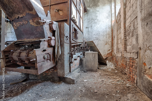 Old, abandoned and forgotten brick factory photo