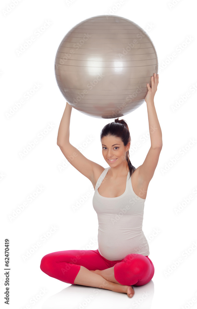 Beautiful pregnant woman doing pilates Beautiful pregnant woman doing pilates