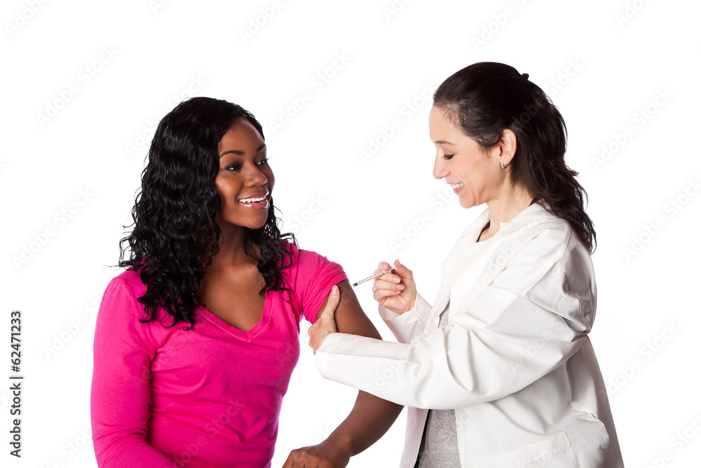 Doctor injecting vaccination in patient