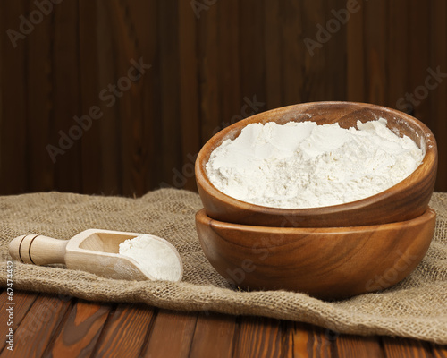 Flour in wooden bow.