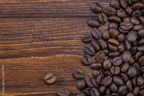 coffee beans on wooden background photo