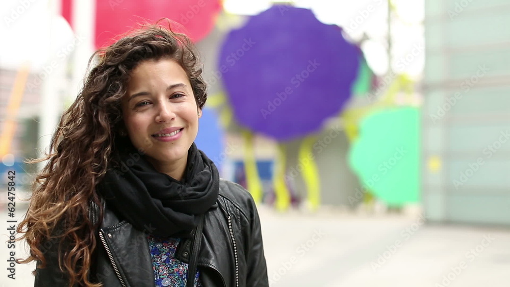 Portrait of a young attractive woman smiling Portrait of a young attractive woman smiling