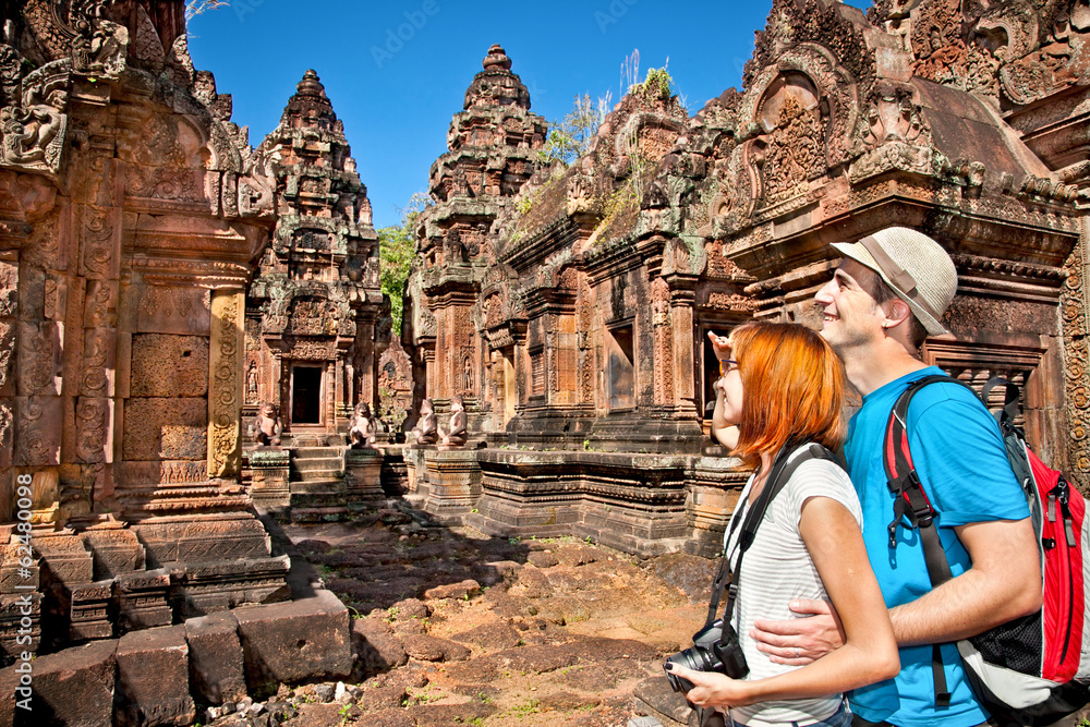 Beautiful young couple at Banteay Srei temple, Cambodia.