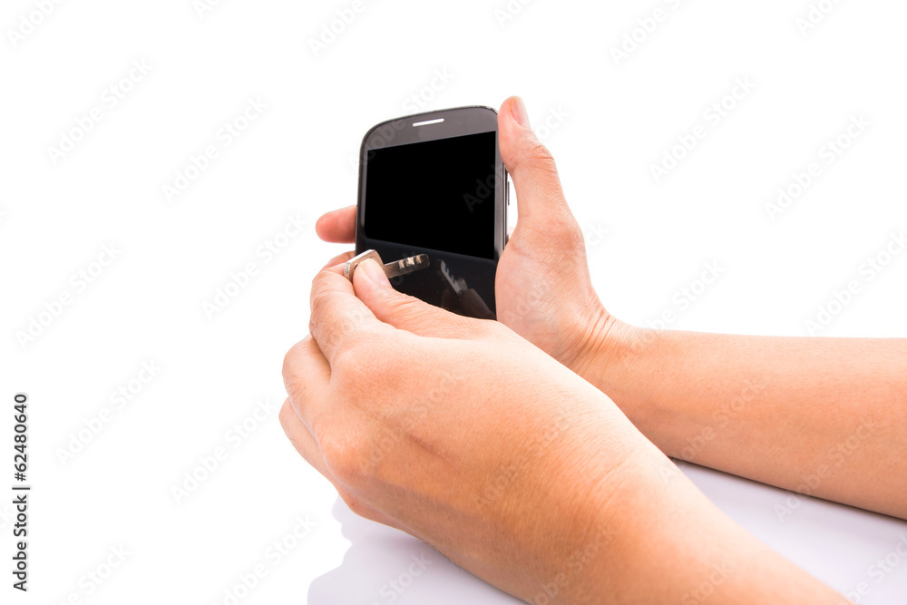 Concept image of holding key to secure data in in a smartphone Concept image of holding key to secure data in in a smartphone