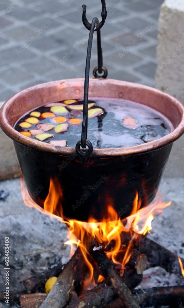 huge copper cauldron with the tasty mulled wine huge copper cauldron with the tasty mulled wine