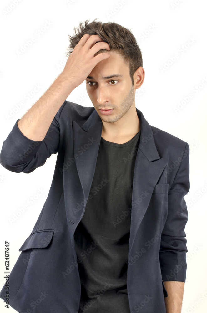 Young beautiful businessman stressed at work, overworking Young beautiful businessman stressed at work, overworking