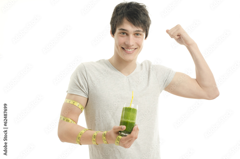 Man measuring his biceps with centimeter while drinking smoothie Man measuring his biceps with centimeter while drinking smoothie
