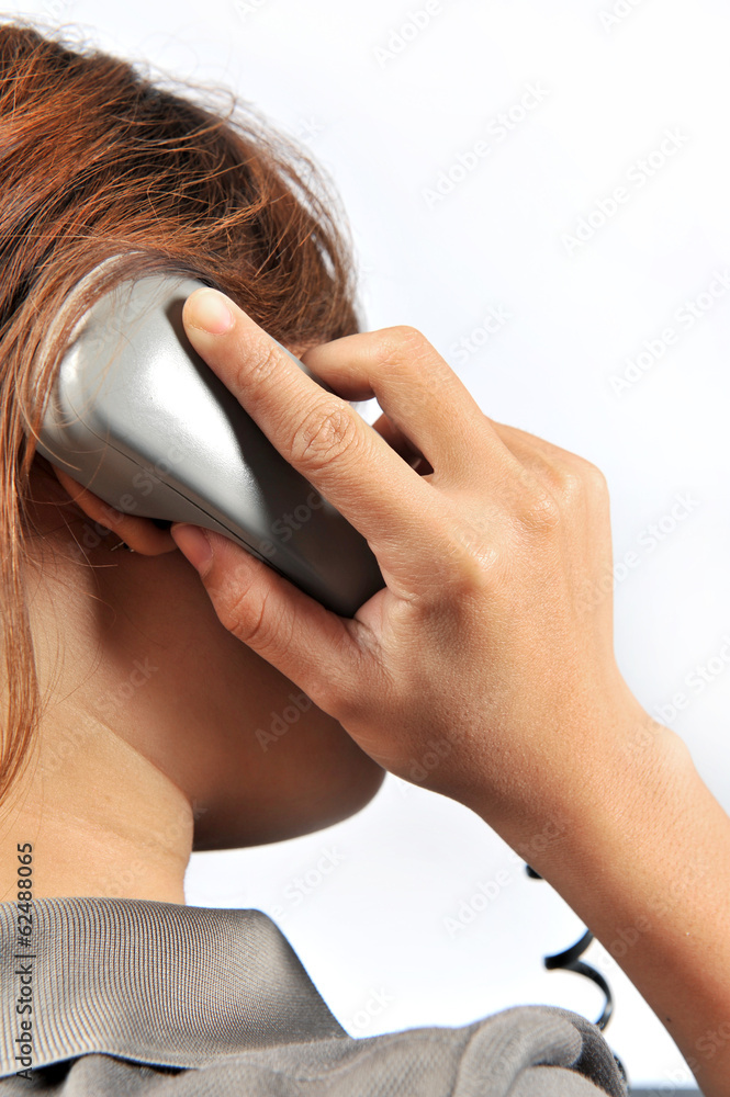 Naklejka premium Woman talking on telephone