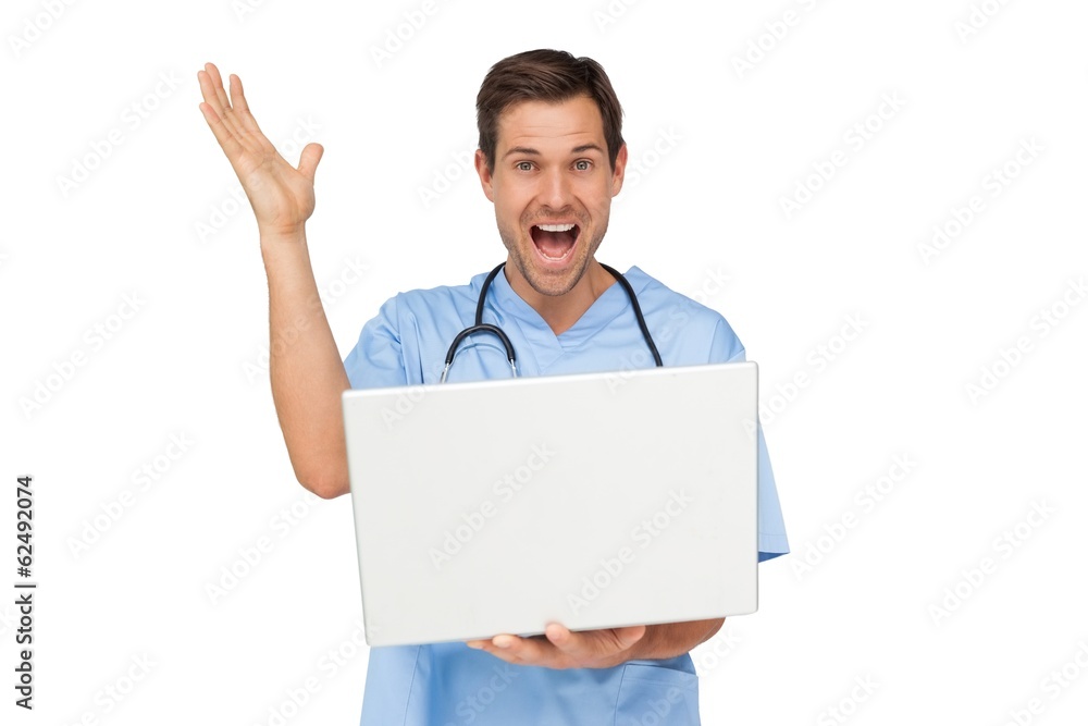 Portrait of a male surgeon with laptop shouting Portrait of a male surgeon with laptop shouting