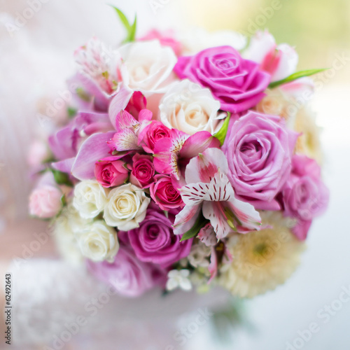 Bridal bouquet. Beautiful bouquet in hand of bride