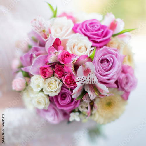 фотографія Bridal bouquet. Beautiful bouquet in hand of bride