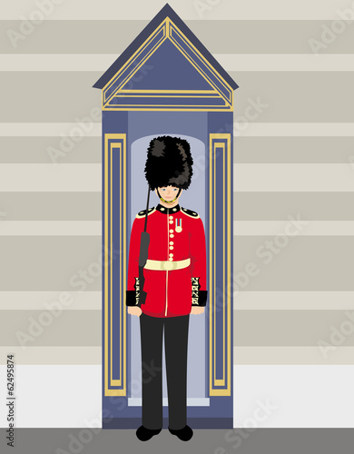 royal British guardsman holding a rifle and standing near a guar