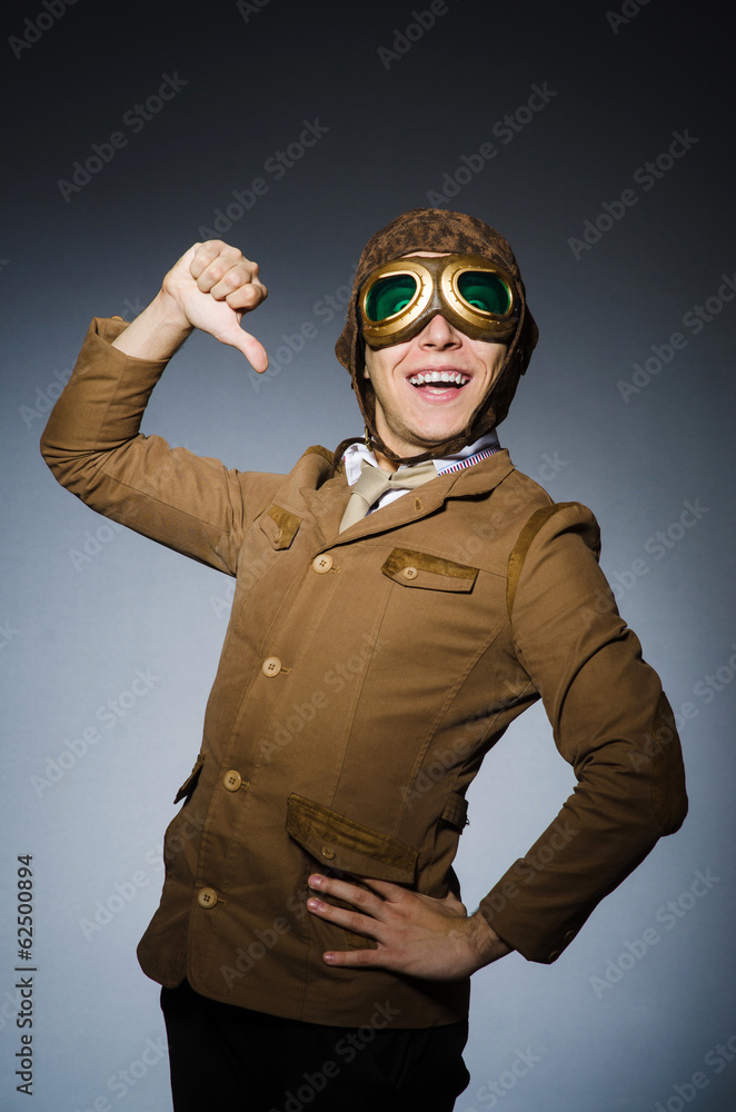 Funny pilot with goggles and helmet Funny pilot with goggles and helmet