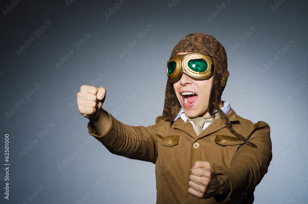 Funny pilot with goggles and helmet Funny pilot with goggles and helmet