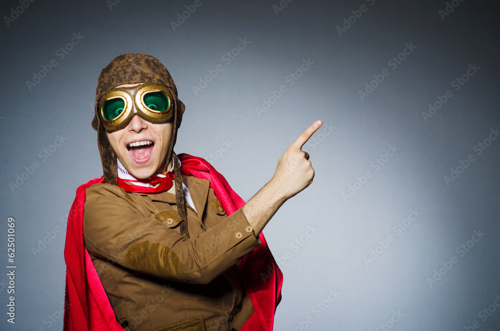 Funny pilot with goggles and helmet Funny pilot with goggles and helmet