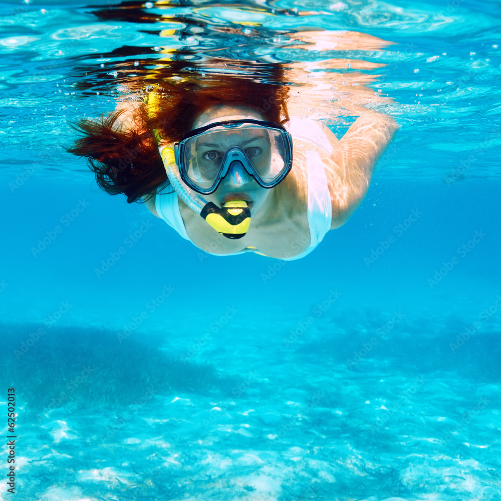 Fototapeta premium Woman with mask snorkeling