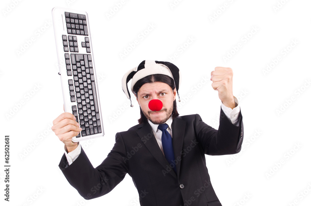 Funny clown with keyboard isolated on white Funny clown with keyboard isolated on white