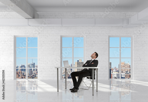 businessman sitting in room © Who is Danny