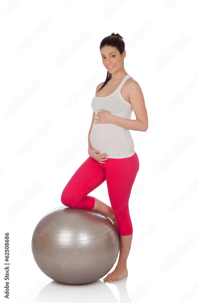 Beautiful pregnant woman doing pilates Beautiful pregnant woman doing pilates