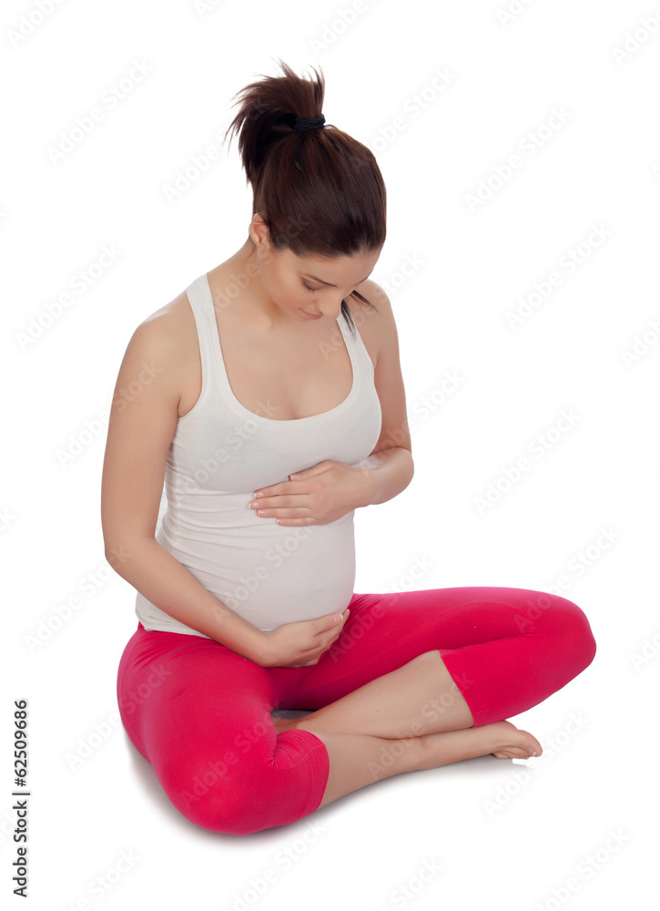Beautiful pregnant woman doing yoga Beautiful pregnant woman doing yoga