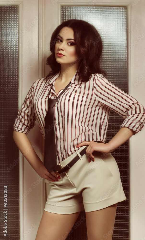 Portrait of beautiful young woman with makeup in fashion clothes Portrait of beautiful young woman with makeup in fashion clothes