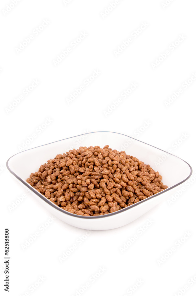 Delicious and healthy cereal in bowl isolated on white Delicious and healthy cereal in bowl isolated on white