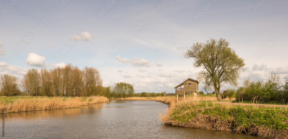 Wooden bird watching hut on concrete piles Wooden bird watching hut on concrete piles