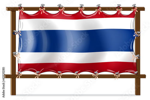 The flag of Thailand attached to the wooden frame