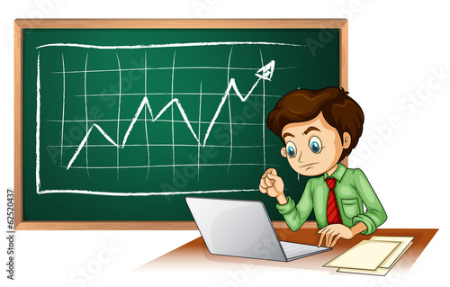 A blackboard with a chart at the back of a businessman