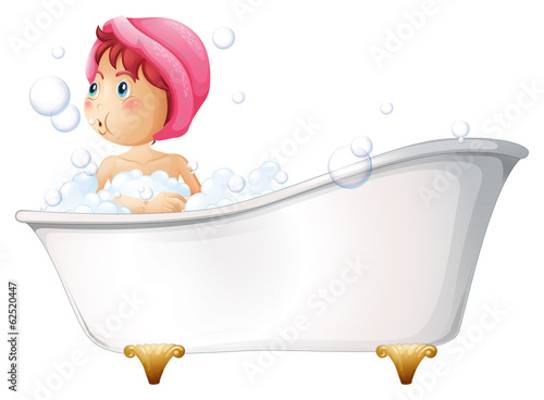 A young girl taking a bath