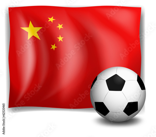 A soccer ball in front of the Chinese flag