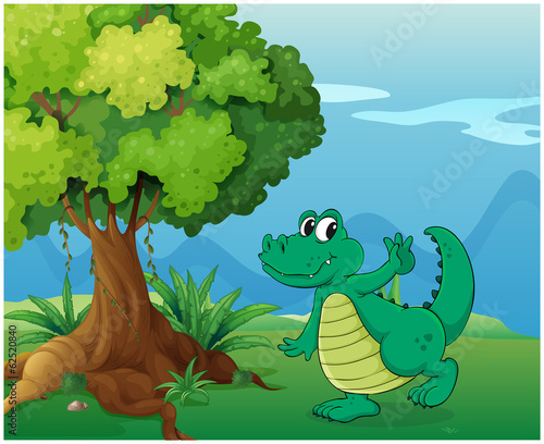 A crocodile near the tree