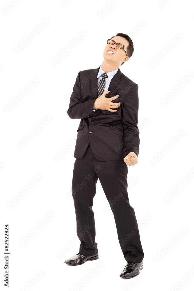 Businessman having a heart attack Businessman having a heart attack