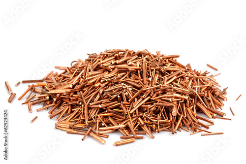Copper wire is cut into pieces isolated on white background.