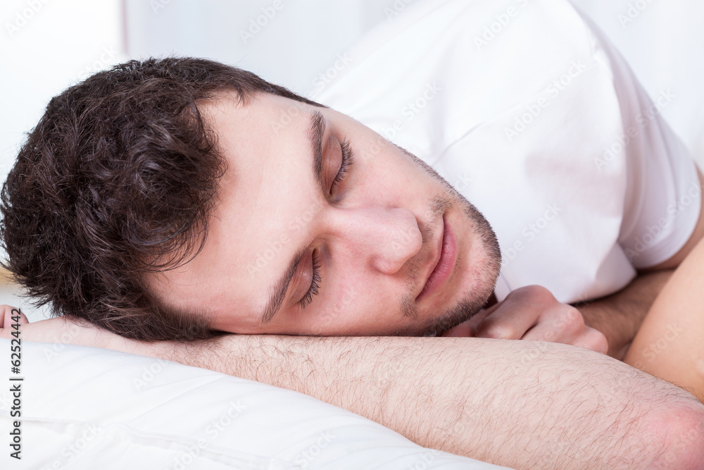 Young man during sleeping Young man during sleeping