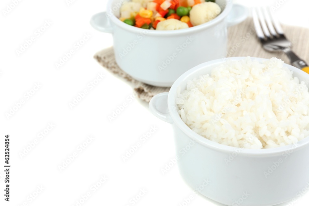 Cooked rice and vegetables isolated on white Cooked rice and vegetables isolated on white