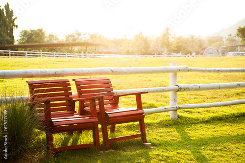 red armchair in farmland