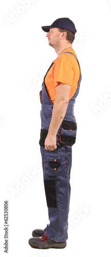Worker wearing overalls.