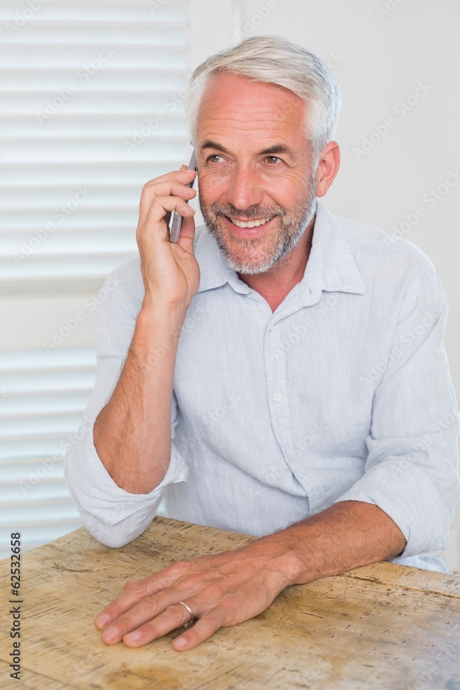 Mature man using mobile phone Mature man using mobile phone