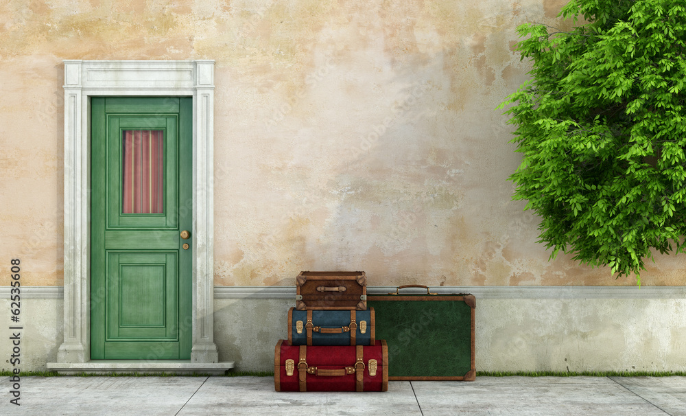 Fototapeta premium Old house with vintage suitcases