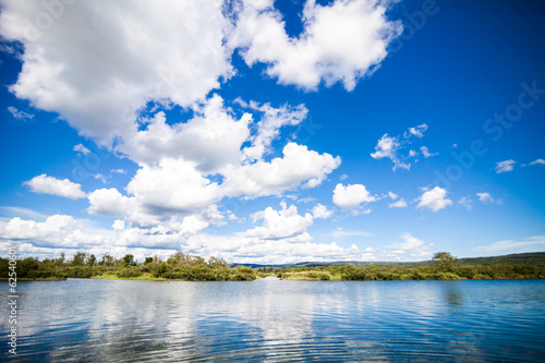 Fototapeta Naklejka Na Ścianę i Meble -  Calm River and Amazing Blue Sky