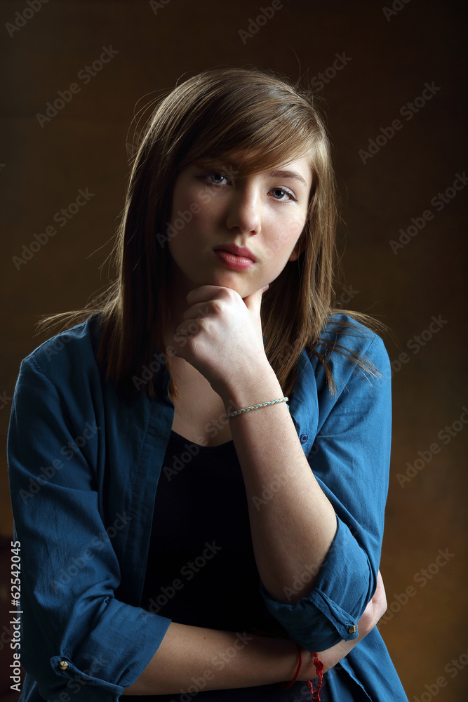 Portrait of beautiful teenage girl with long brown hair Portrait of beautiful teenage girl with long brown hair