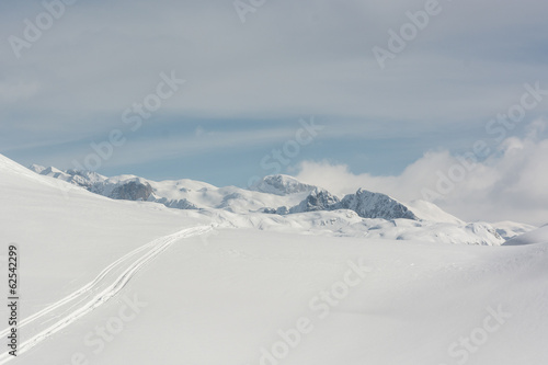 Ski track in a snow © anzebizjan