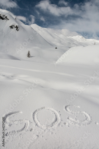 SOS written in the snow photo