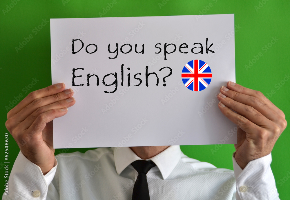 Businessman showing a sheet with text Do you speak English Businessman showing a sheet with text Do you speak English
