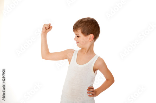 Billede på lærred Boy showing his muscle