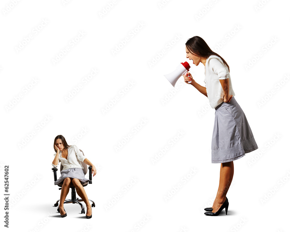 businesswoman screaming at lazy woman